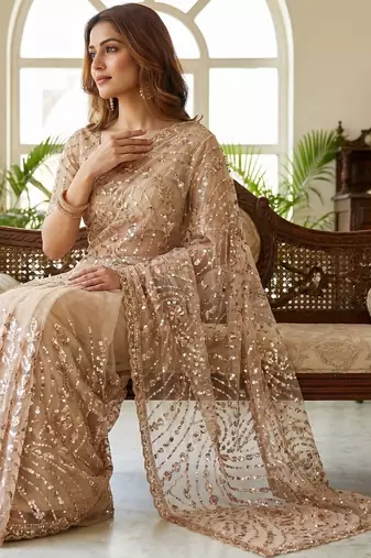 women's rust net partywear saree with unstitched blouse