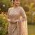 Women's rust net partywear saree with unstitched blouse