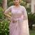 Women's pink net partywear saree with unstitched blouse