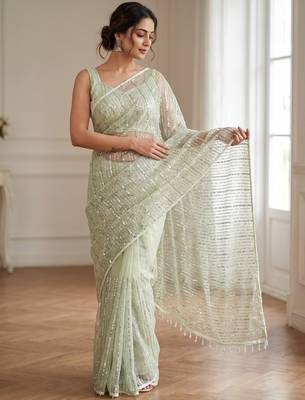 Women's pistq net partywear saree with unstitched blouse 1
