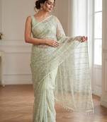 Women's pistq net partywear saree with unstitched blouse