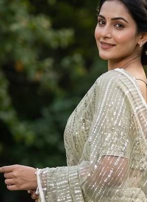 Women's pistq net partywear saree with unstitched blouse 2