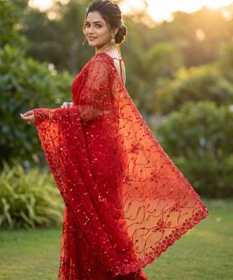 Women's red net partywear saree with unstitched blouse 2