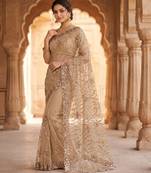 Women's rust net partywear saree with unstitched blouse