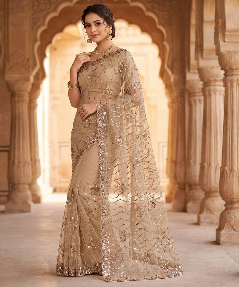 Women's rust net partywear saree with unstitched blouse