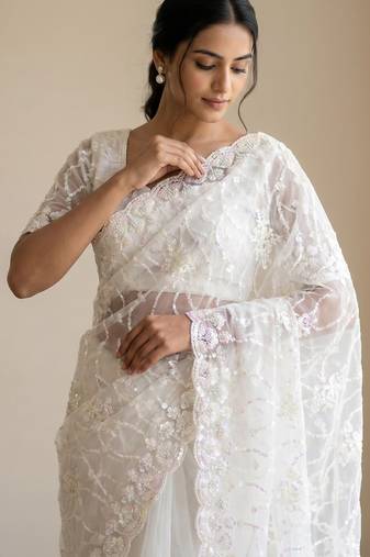 women's white net partywear saree with unstitched blouse