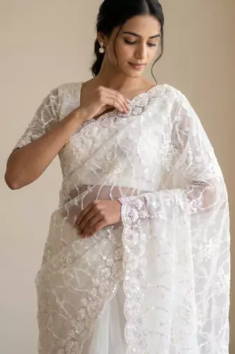 women's white net partywear saree with unstitched blouse
