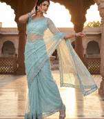 Women's pista net partywear saree with unstitched blouse