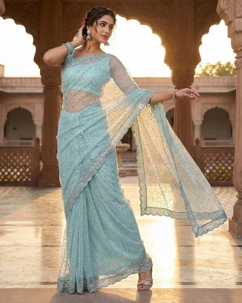 Women's pista net partywear saree with unstitched blouse