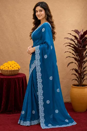Turquoise soft shimmer chiffon embroidery work saree with unstitched blouse piece
