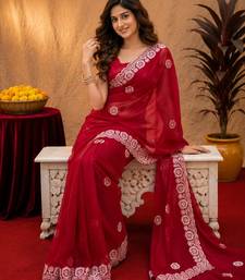 Red soft shimmer chiffon embroidery work saree with unstitched blouse piece
