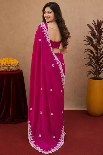 Rani pink soft shimmer chiffon embroidery work saree with unstitched blouse piece