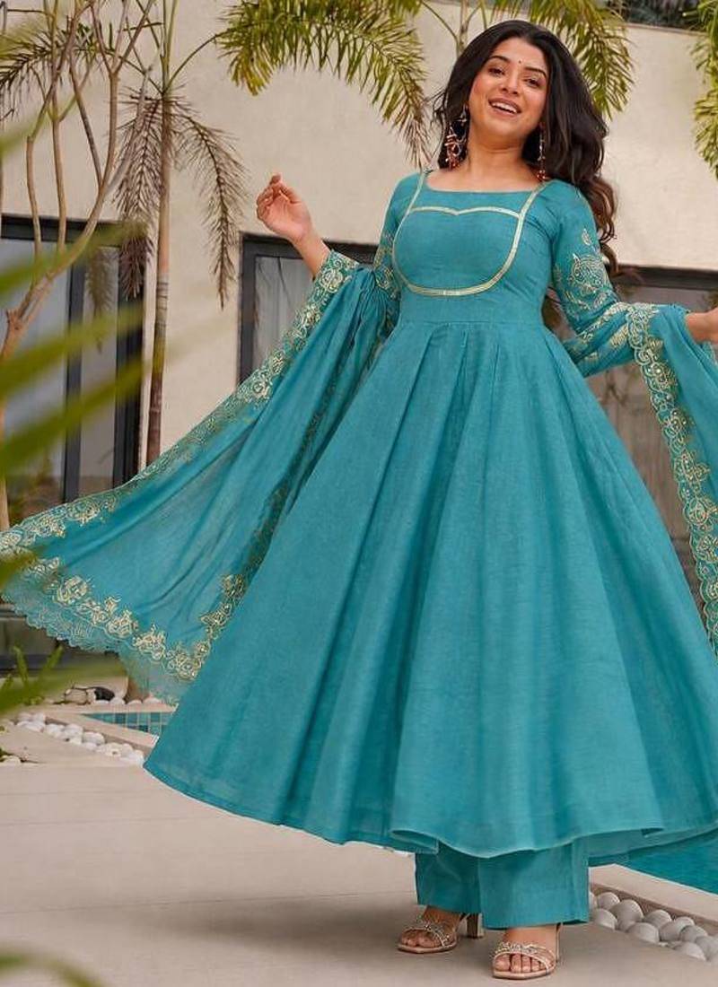 teal green color fancy embroidery sequin and cording work silk blend gown set