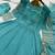 teal green color fancy embroidery sequin and cording work silk blend gown set