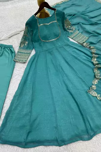teal green color fancy embroidery sequin and cording work silk blend gown set