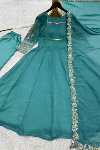 teal green color fancy embroidery sequin and cording work silk blend gown set