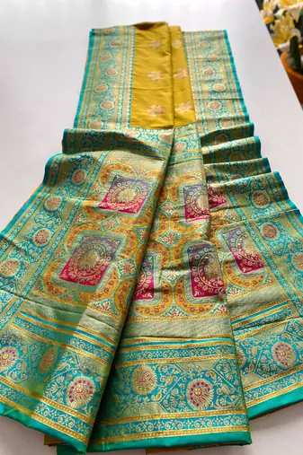 mustard yellow color intricate color thread weaving design rich weaving pallu benarasi silk blend sarees