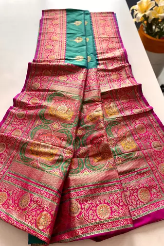 green color intricate color thread weaving design rich weaving pallu benarasi silk blend sarees