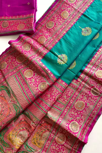 green color intricate color thread weaving design rich weaving pallu benarasi silk blend sarees