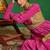 Fuchsia pink green embroidered crepe and glass organza anarkali set