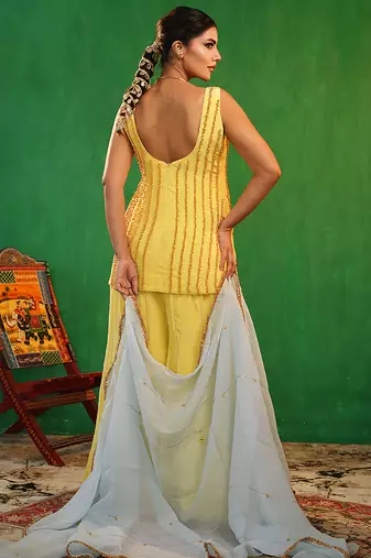 Pastel yellow embroidered crepe and glass organza kurta set