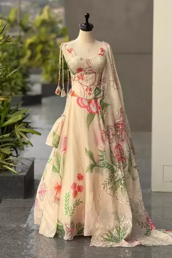 cream floral silk lehenga with free size upto 44