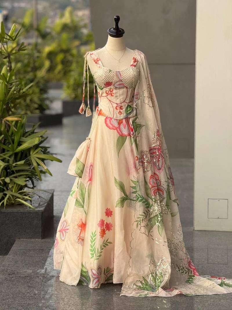 cream floral silk lehenga with free size upto 44