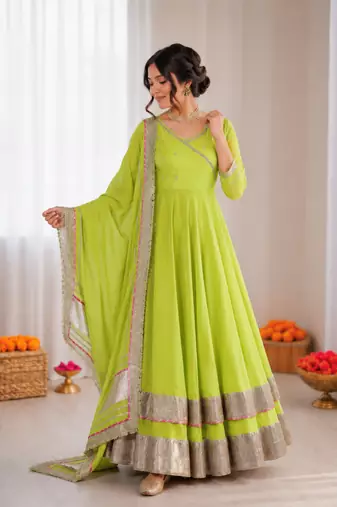 Parrot green organza silk mirror work lehenga style suit
