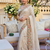Cream tissue embroidery work saree with work blouse piece