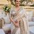 Cream tissue embroidery work saree with work blouse piece