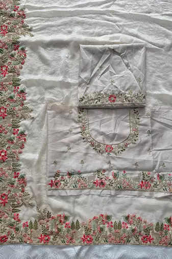 Cream tissue embroidery work saree with work blouse piece