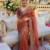 Rust tissue embroidery work saree with work blouse piece