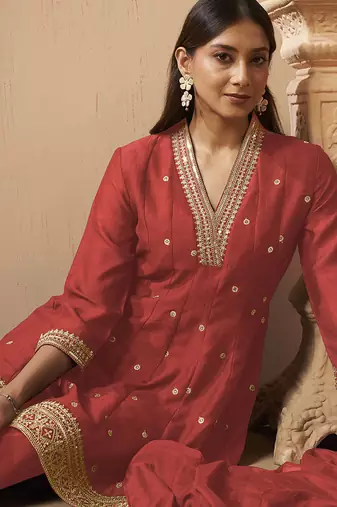 Red embroidered vichitra silk gown