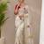 Cream tissue embroidery work saree with work blouse piece
