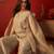 Beige silk chiffon embroidered kurta set.