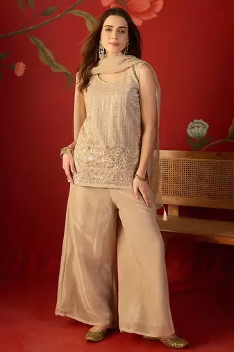 Beige silk chiffon embroidered kurta set.
