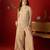 Beige silk chiffon embroidered kurta set.