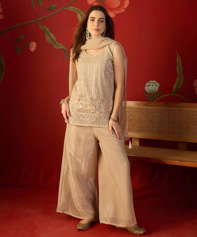 Beige silk chiffon embroidered kurta set.