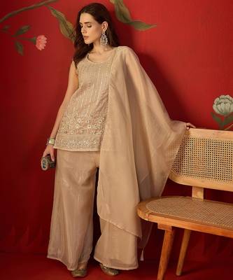 Beige silk chiffon embroidered kurta set. 1