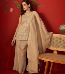 Beige silk chiffon embroidered kurta set.
