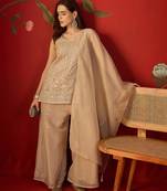 Beige silk chiffon embroidered kurta set.