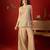 Beige silk chiffon embroidered kurta set.