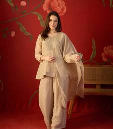 Beige silk chiffon embroidered kurta set.