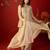 Beige silk chiffon embroidered kurta set.