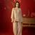 Beige silk chiffon embroidered kurta set.