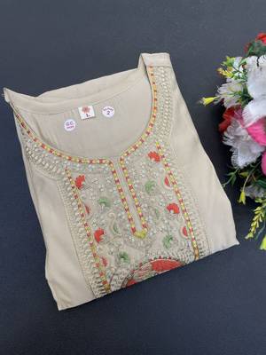 Chiku viscose emboidered straight kurta set with orange printed dupatta & pant 7