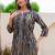 Women Printed Regular Kurta with Trousers