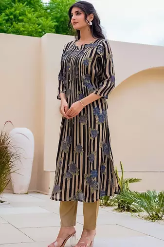 Women Printed Regular Kurta with Trousers