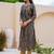 Women Printed Regular Kurta with Trousers