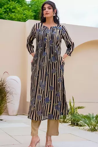 Women Printed Regular Kurta with Trousers